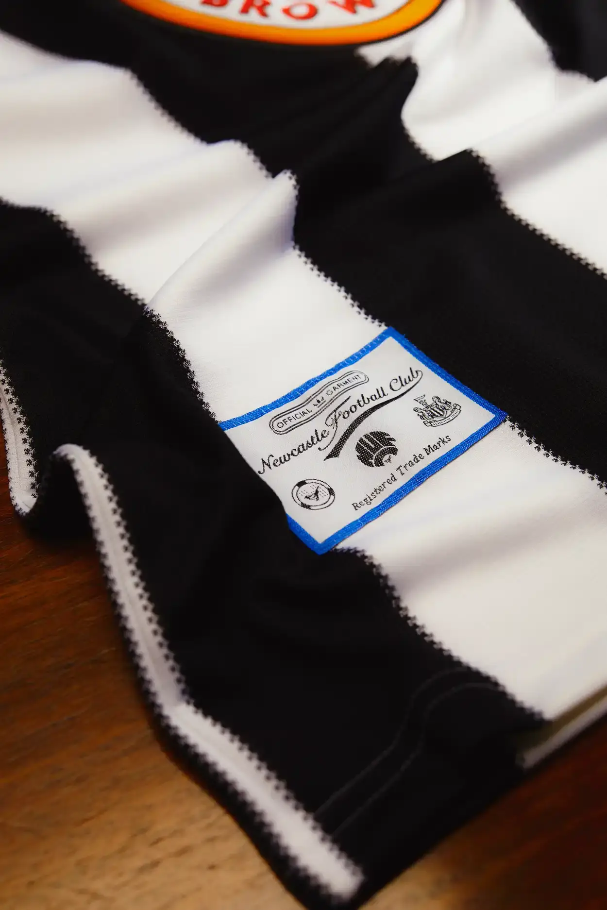 Adidas Newcastle United 1995-96 home shirt remake featuring black and white stripes, Henley collar, adidas trefoil logo, and Newcastle Brown Ale sponsor (image 5 of 5)