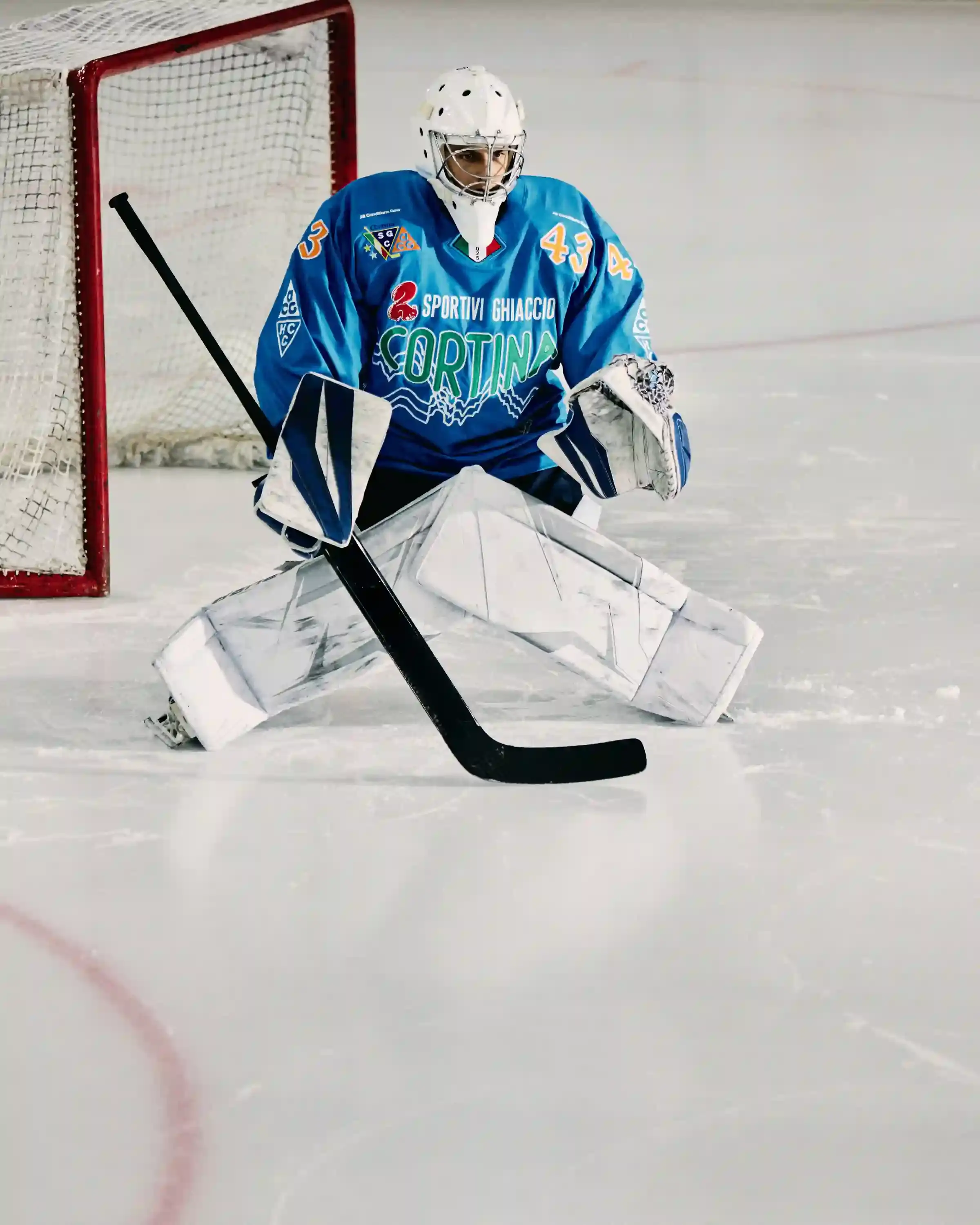 NIKE ACG AND SG CORTINA DEBUT MOUNTAIN-INSPIRED HOCKEY JERSEY image describes collaboration between Nike ACG and SG Cortina hockey team on special edition jersey. Design features Dolomite mountain silhouettes. Jersey worn once during December 7 match at Olympic Ice Stadium in Cortina d'Ampezzo. Limited quantities available at Acqua Salata store starting December 8.