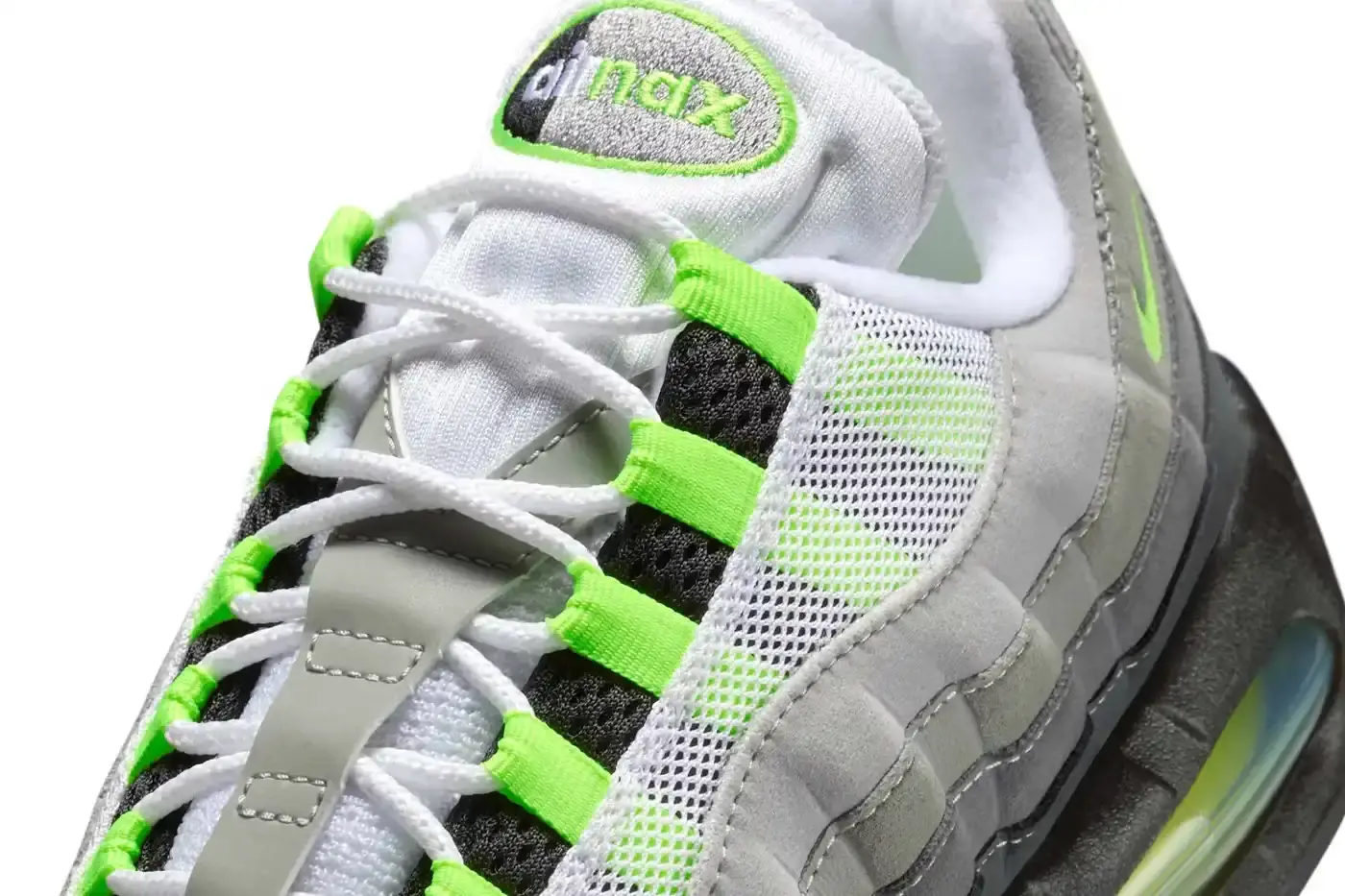 NIKE'S ORIGINAL NEON AIR MAX 95 RETURNS THIS APRIL This article announces the return of Nike's Air Max 95 "Neon" sneakers for their 30th anniversary. It details the April 18, 2025 release date, $185 USD price point, and describes the classic Black/Neon Yellow-Cool Grey colorway with its human anatomy-inspired gradient design. The article explains the distinctive neon green accents on the eyelets, mudguard, Air unit, mini Swoosh, and tongue branding, noting its historical significance in athletic footwear. (image 7 of 7)