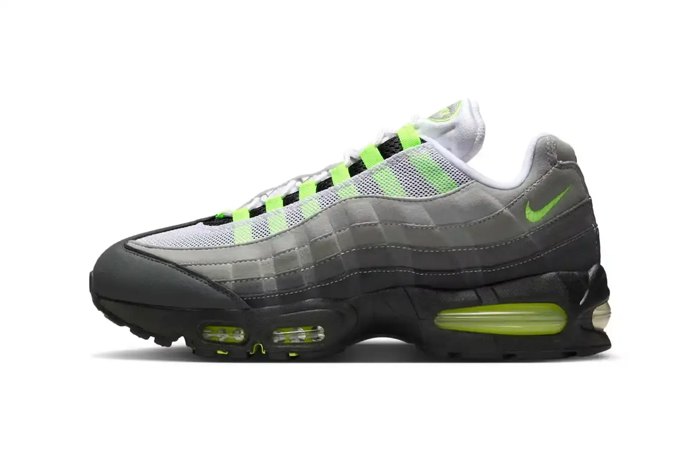 NIKE'S ORIGINAL NEON AIR MAX 95 RETURNS THIS APRIL This article announces the return of Nike's Air Max 95 "Neon" sneakers for their 30th anniversary. It details the April 18, 2025 release date, $185 USD price point, and describes the classic Black/Neon Yellow-Cool Grey colorway with its human anatomy-inspired gradient design. The article explains the distinctive neon green accents on the eyelets, mudguard, Air unit, mini Swoosh, and tongue branding, noting its historical significance in athletic footwear.