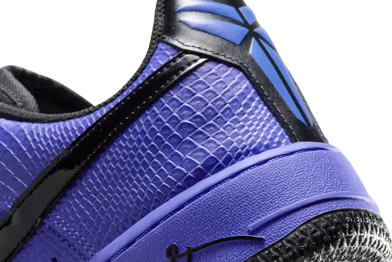 NIKE REVEALS FC BARCELONA KOBE BRYANT AIR FORCE 1 image about Nike's upcoming sneaker release featuring FC Barcelona and Kobe Bryant branding on an Air Force 1 Low silhouette. The shoe has a purple textured upper with black accents and Barcelona club crests. Includes product details, pricing at $150, and expected 2025 release through Nike's retail channels. Content is structured with bullet point summary, product specifications, and background information about the collaboration. (image 8 of 10)