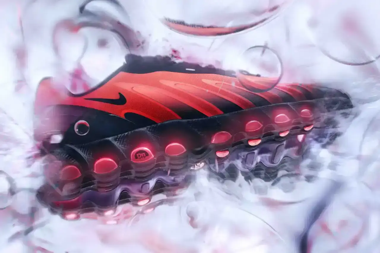 Nike Air Max DN8 sneaker in Hyper Pink colorway, showing a low-profile silhouette with visible Dynamic Air chambers running along the entire sole length.