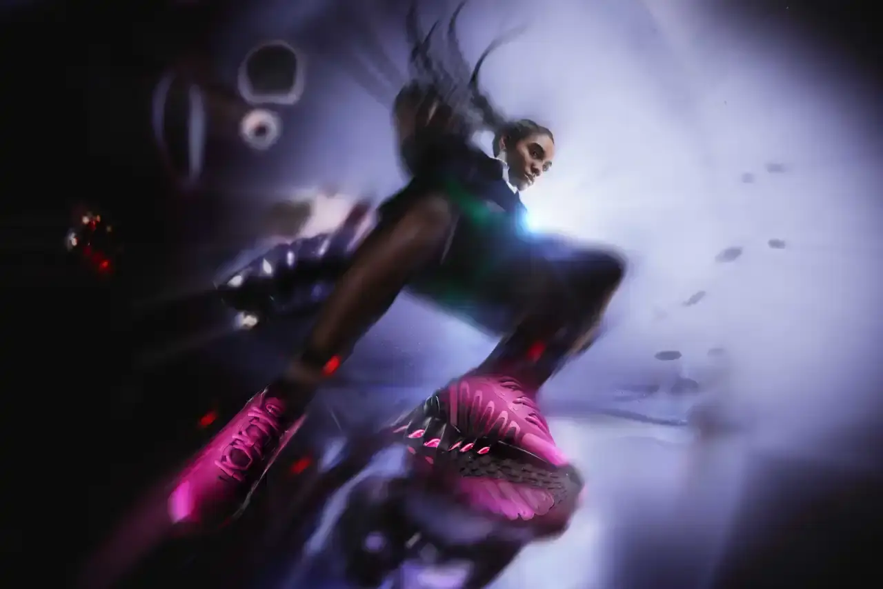 Nike Nike Air Max DN8 sneaker in Hyper Pink colorway, showing a low-profile silhouette with visible Dynamic Air chambers running along the entire sole length. (image 4 of 8)