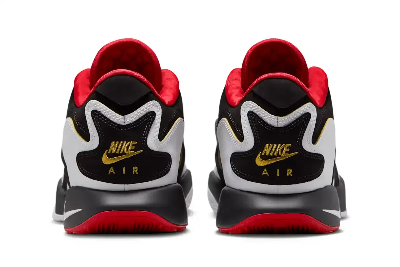 NIKE LEBRON 21 "PRIME '93" SET FOR JULY RELEASE image about Nike's upcoming LeBron 21 "Prime '93" sneaker release. The shoe merges LeBron James' basketball signature model with design elements from Deion Sanders' Air Diamond Turf 93 football shoe. Key details include July 17 release date, $210 retail price, black/white/red/gold colorway, and availability through Nike SNKRS. Article contains product specifications, design features, pricing information, and historical context about both athletes' signature shoes. (image 5 of 7)