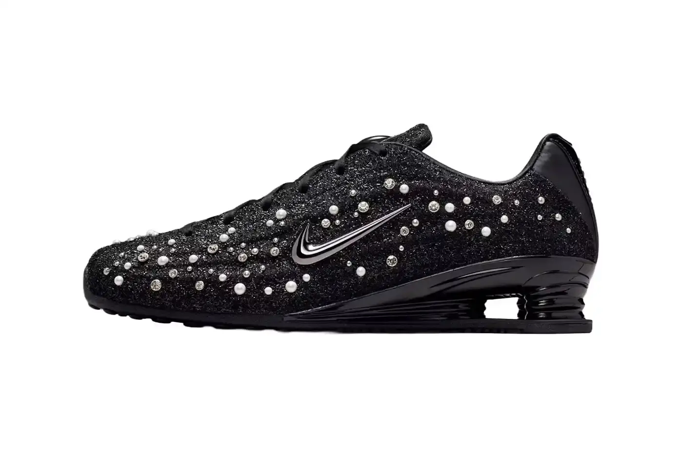NIKE SHOX Z YEAR OF THE HORSE WITH PEARLS Nike Shox Z sneaker in black and silver colorway features tweed upper, pearl and rhinestone embellishments, and traditional Shox cushioning technology.