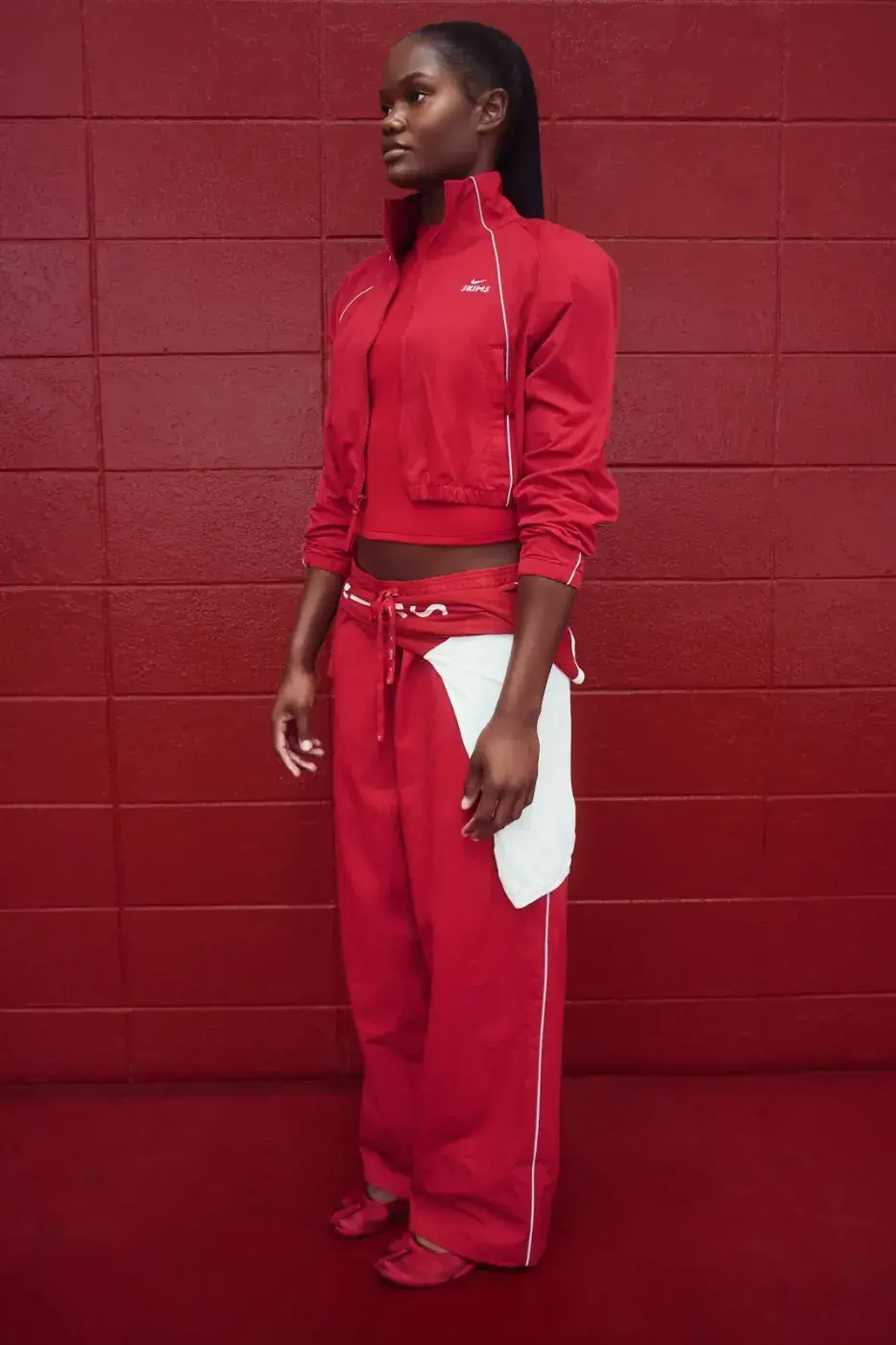 NIKE AND SKIMS LAUNCH FALL OUTERWEAR COLLECTION image detailing the Nike and SKIMS fall outerwear launch, material specifications, color options, campaign details, and global release dates. (image 2 of 10)