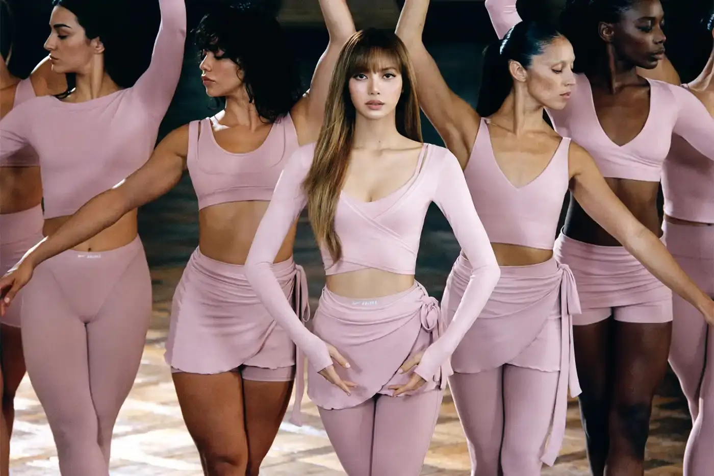 NIKE AND SKIMS DROP BALLET-INSPIRED COLLECTION Nike and SKIMS announce their Spring 2026 collection with ballet-inspired athletic wear, introducing the NikeSKIMS Rift Satin shoe and five material collections. LISA of BLACKPINK appears in the campaign shot in Paris. (image 2 of 2)