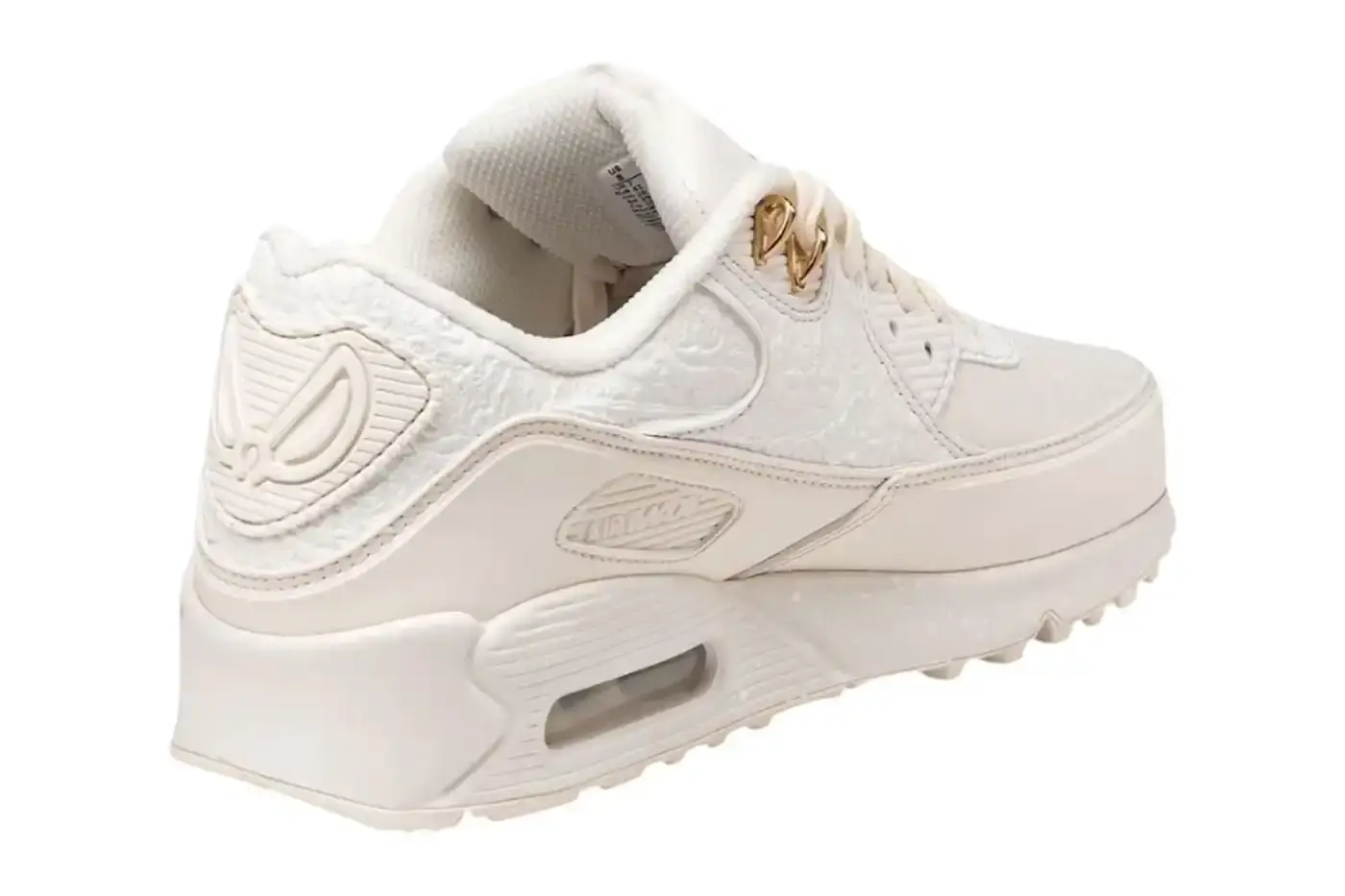 NIKE PARTNERS WITH NIGERIAN ARTIST SLAWN FOR UNIQUE AIR MAX 90 A collaborative design project between Nike and Nigerian artist Slawn, showcasing the creation of two exclusive Air Max 90 sneakers. The piece highlights Slawn's artistic background, his journey from skateboarding to graphic design, and his emergence in the contemporary art scene. The article provides context about the sneakers' design elements, including paint-inspired patterns, leather mudguard, and metallic accents, with information about the release date on the SNKRS app. (image 4 of 4)
