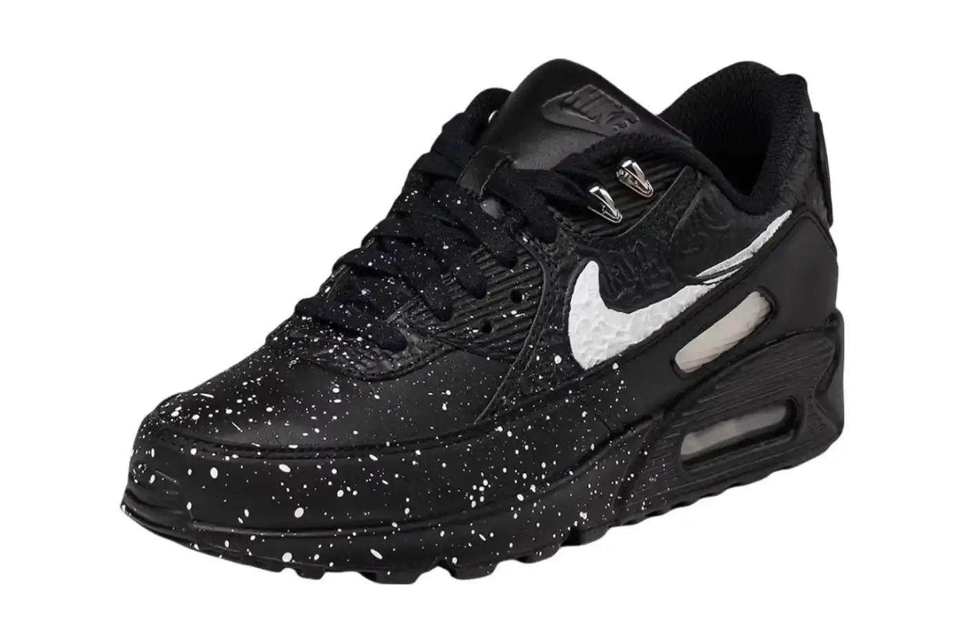 NIKE PARTNERS WITH NIGERIAN ARTIST SLAWN FOR UNIQUE AIR MAX 90 A collaborative design project between Nike and Nigerian artist Slawn, showcasing the creation of two exclusive Air Max 90 sneakers. The piece highlights Slawn's artistic background, his journey from skateboarding to graphic design, and his emergence in the contemporary art scene. The article provides context about the sneakers' design elements, including paint-inspired patterns, leather mudguard, and metallic accents, with information about the release date on the SNKRS app.