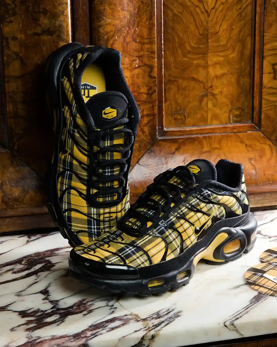 FOOT LOCKER AND ANNA RELEASE NIKE TN TARTAN An article detailing the release of the yellow Nike TN Tartan sneaker by Foot Locker and Italian rapper ANNA. (image 5 of 6)