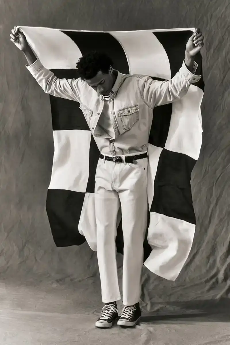 NOAH NOAH Spring/Summer 2025 collection display featuring tailored menswear pieces against a neutral background (image 12 of 16)