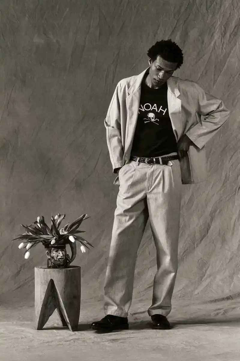 NOAH NOAH Spring/Summer 2025 collection display featuring tailored menswear pieces against a neutral background (image 14 of 16)