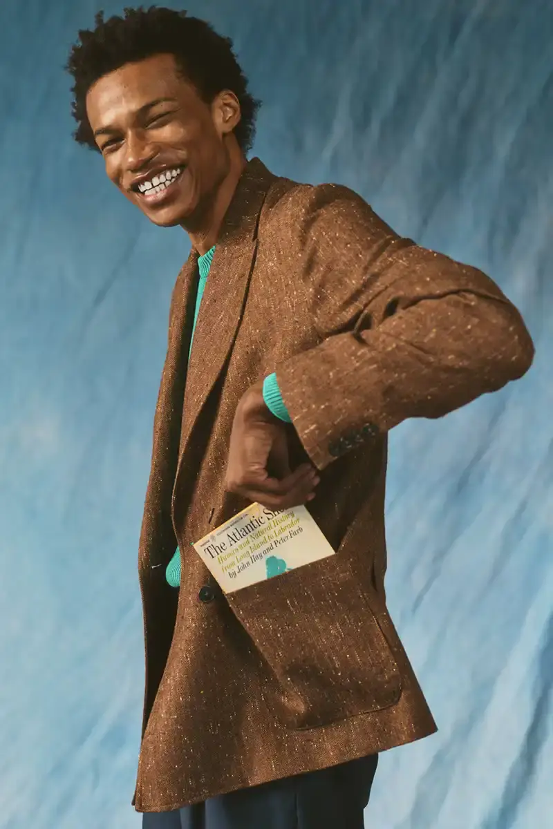NOAH NOAH Spring/Summer 2025 collection display featuring tailored menswear pieces against a neutral background (image 5 of 16)