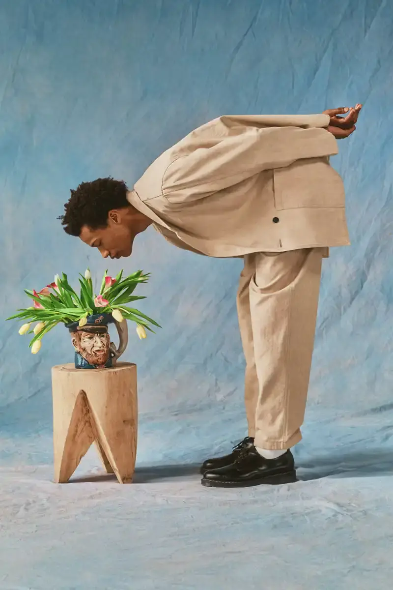 NOAH NOAH Spring/Summer 2025 collection display featuring tailored menswear pieces against a neutral background (image 15 of 16)