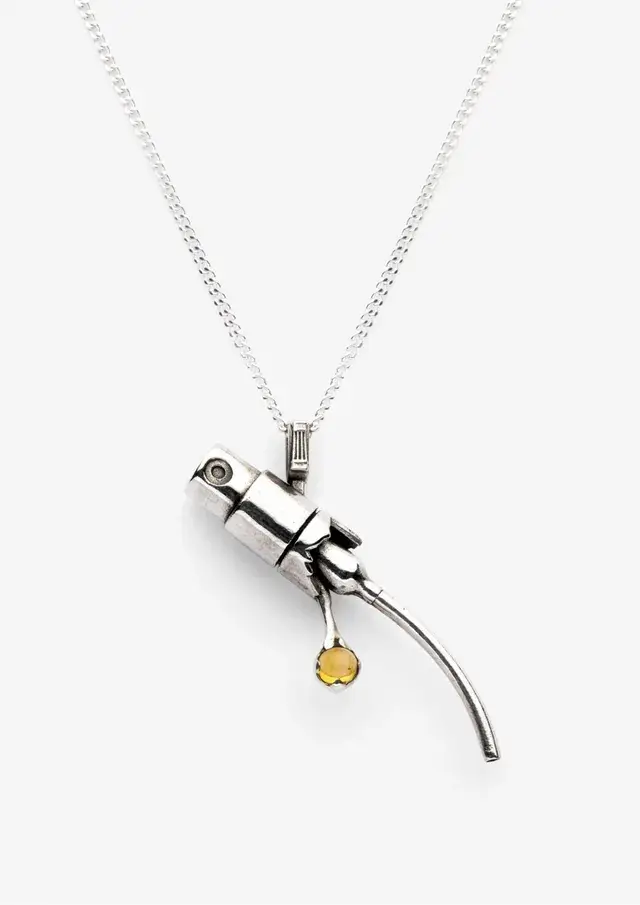 NOTES DE BAS DE PAJE AND TANT D'AVENIR RELEASE FILIGRANE The Filigrane 50 ml perfume extract bottle alongside the 925 sterling silver and citrine pendant by Tant d'Avenir and Notes de Bas de Paje. (image 3 of 6)