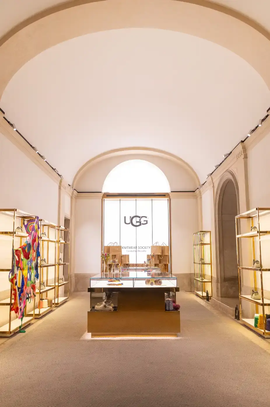 NUGNES HOSTS UGG WORKSHOP IN TRANI, PUGLIA image about a collaborative retail event between Italian luxury boutique Nugnes and footwear brand UGG, featuring a hands-on crochet workshop where participants customized UGG Peakmod boots under the guidance of artist Alicesofia at the Trani location on July 17, 2025. (image 2 of 9)