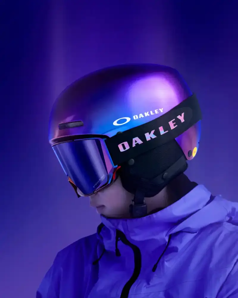 OAKLEY AURA COLLECTION USES COLOR-CHANGING PAINT Oakley introduces the Aura collection featuring eyewear, helmets, and accessories with color-changing paint in purple, green, red, and gold gradients. (image 6 of 6)