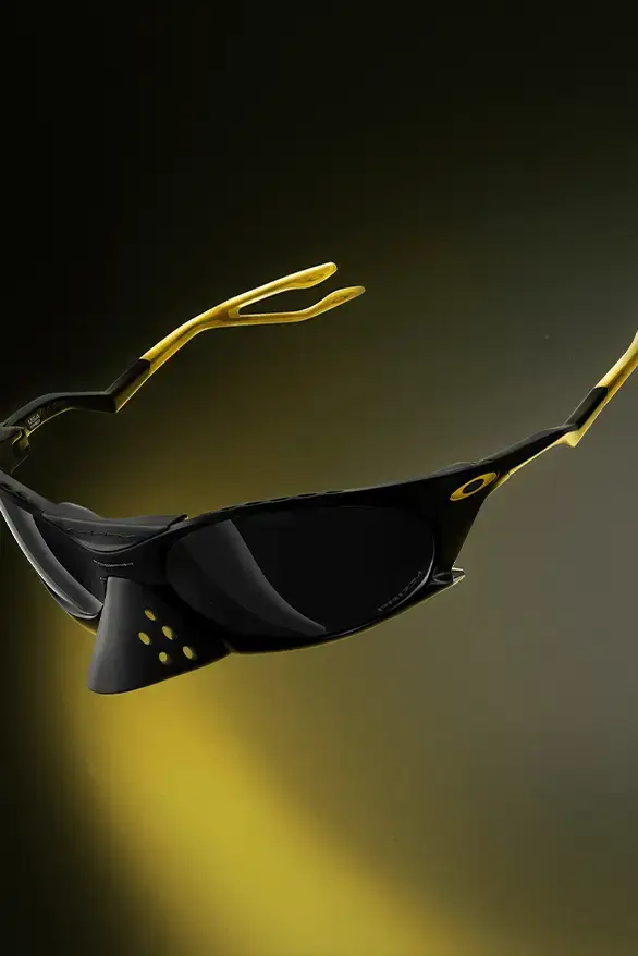 Oakley Oakley Plantaris sunglasses in black and yellow, with articulated arms and removable nose guards, showcasing a modern design inspired by frog anatomy, created in collaboration with Podpah podcast (image 3 of 4)