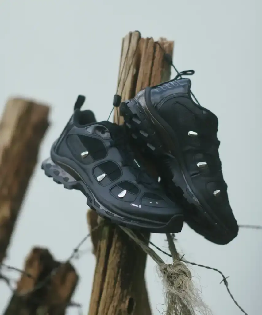 OAMC AND SALOMON RELEASE XT-QUEST HYBRID SNEAKERS image details the OAMC x Salomon XT-QUEST Black/Silver shoe release, describing the design, features, and technical specifications. (image 4 of 4)