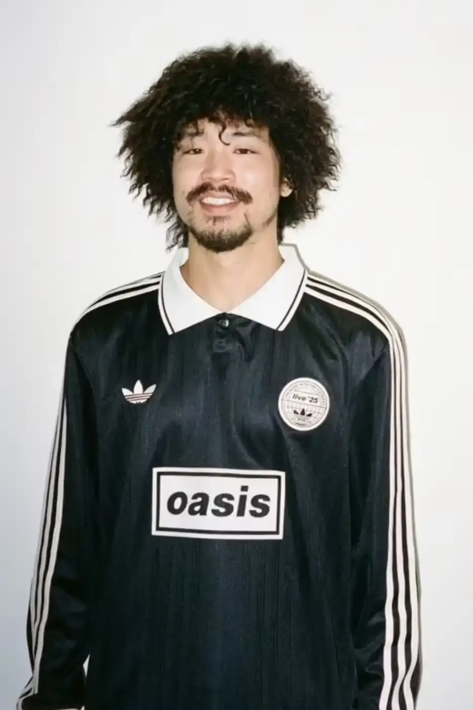 OASIS AND ADIDAS ORIGINALS SS26 APPAREL image detailing the upcoming SS26 clothing release from Oasis and adidas Originals featuring product descriptions and purchase instructions. (image 3 of 5)