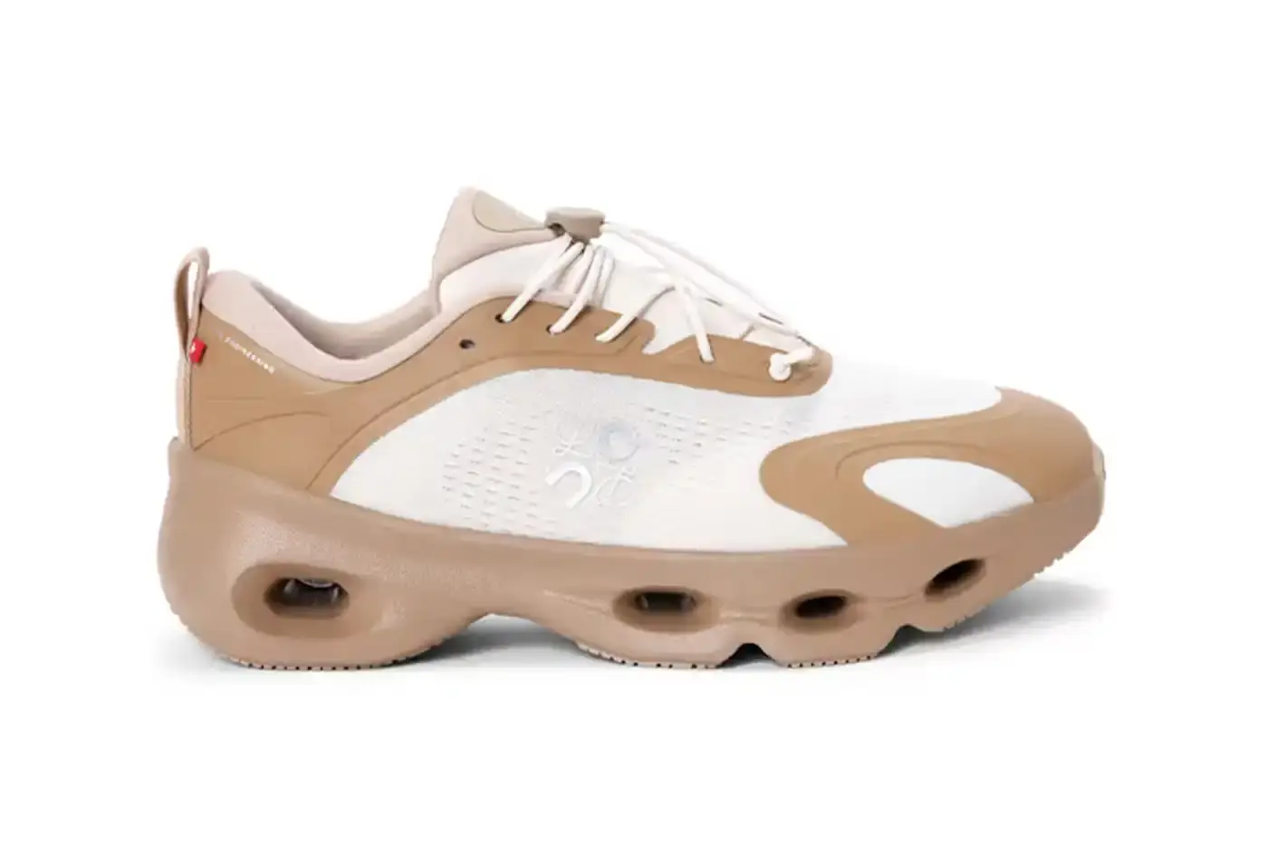 ON AND LOEWE LAUNCH CLOUDSOLO SNEAKER On and LOEWE unveil their latest collaboration for fall/winter 2025, featuring the new Cloudsolo sneaker with innovative CloudTec technology, an updated Cloudtilt slip-on design, and a technical apparel collection. The full line launches online October 16. (image 7 of 20)