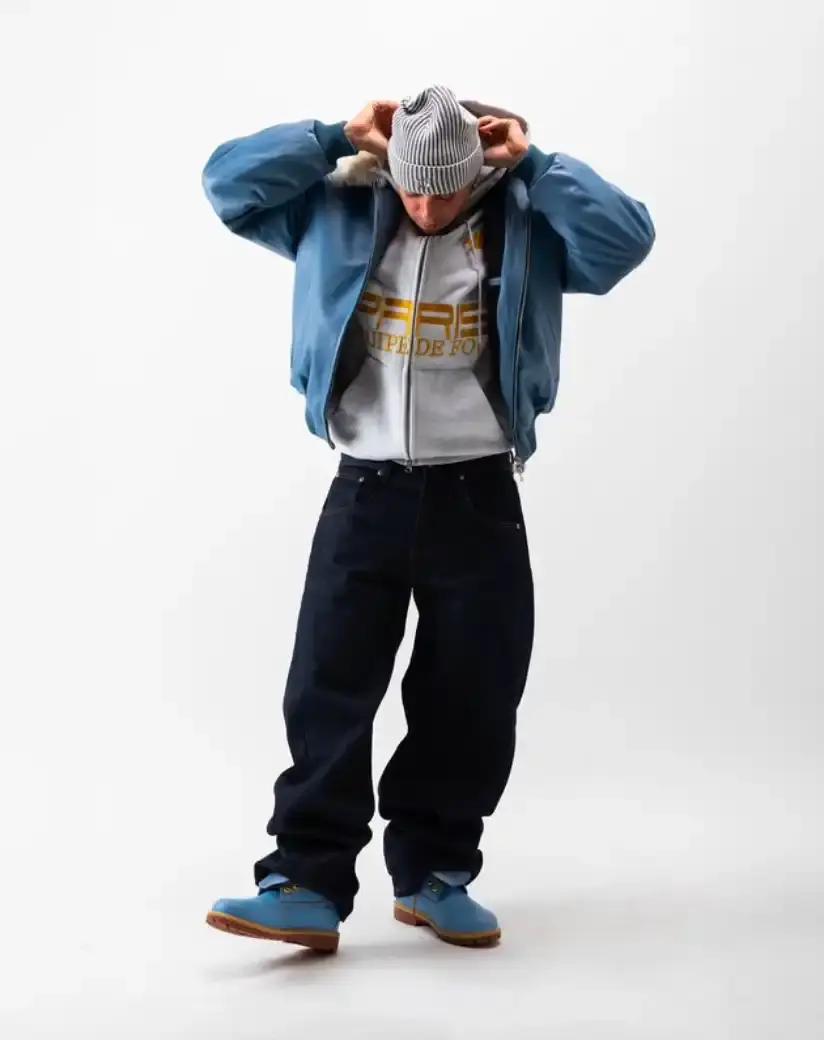 ONE BLOCK DOWN FW25 COLLECTION LAUNCHES IN MILAN Article about One Block Down's Fall/Winter 2025 collection, which combines medieval imagery, hockey aesthetics, and European winter sports culture in a streetwear context. (image 10 of 21)