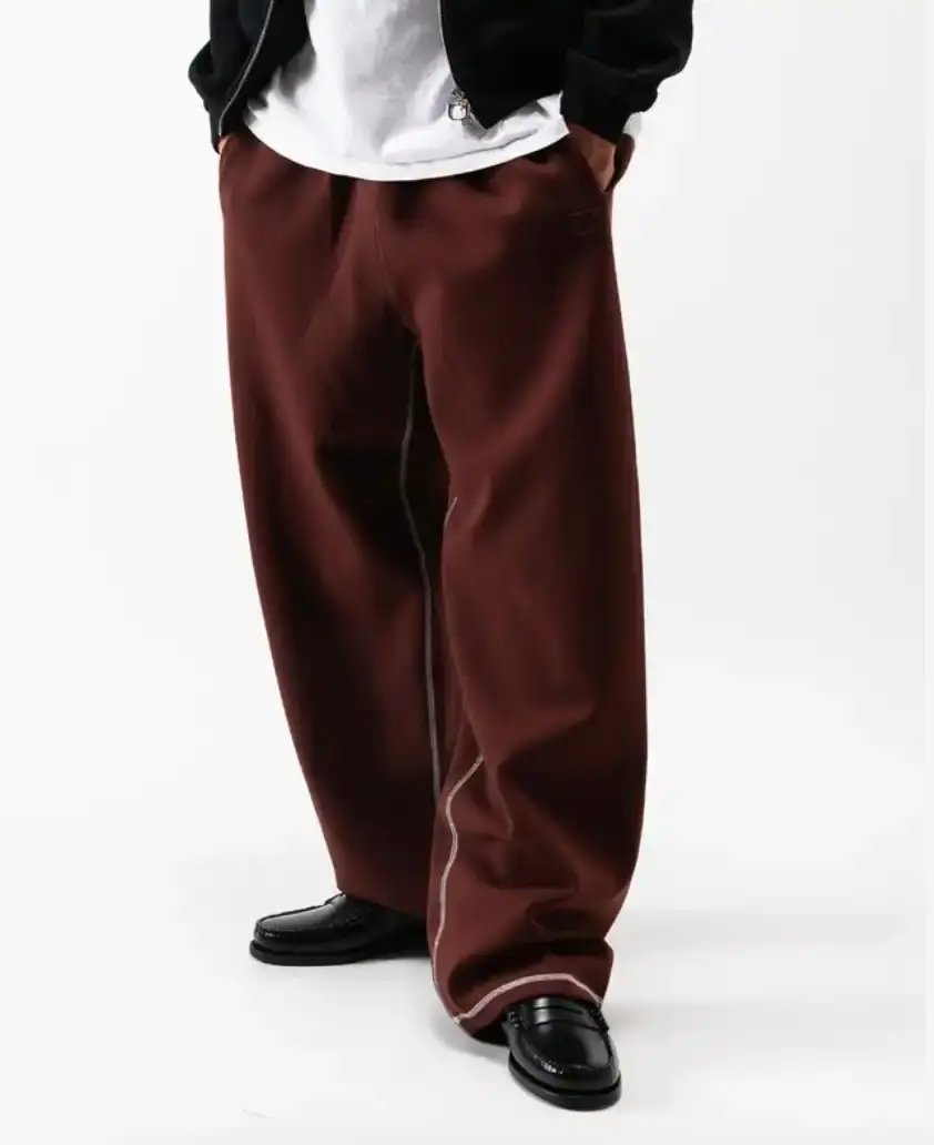 ONE BLOCK DOWN FW25 COLLECTION LAUNCHES IN MILAN Article about One Block Down's Fall/Winter 2025 collection, which combines medieval imagery, hockey aesthetics, and European winter sports culture in a streetwear context. (image 17 of 21)