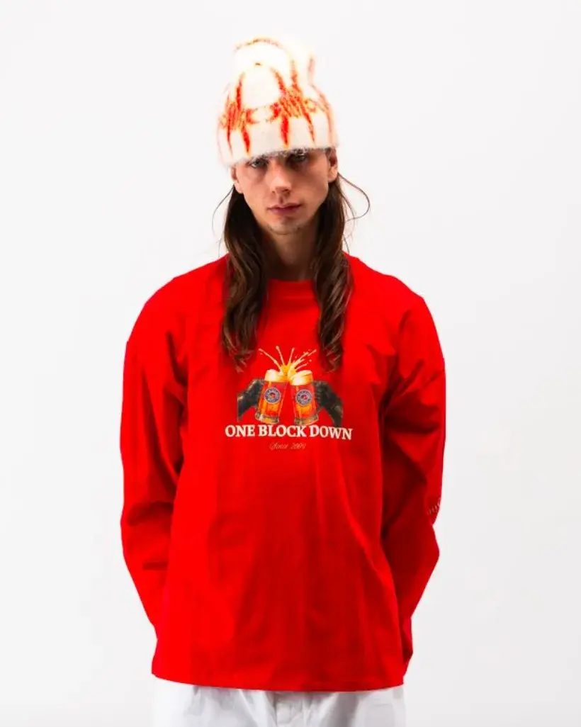 ONE BLOCK DOWN FW25 COLLECTION LAUNCHES IN MILAN Article about One Block Down's Fall/Winter 2025 collection, which combines medieval imagery, hockey aesthetics, and European winter sports culture in a streetwear context. (image 7 of 21)
