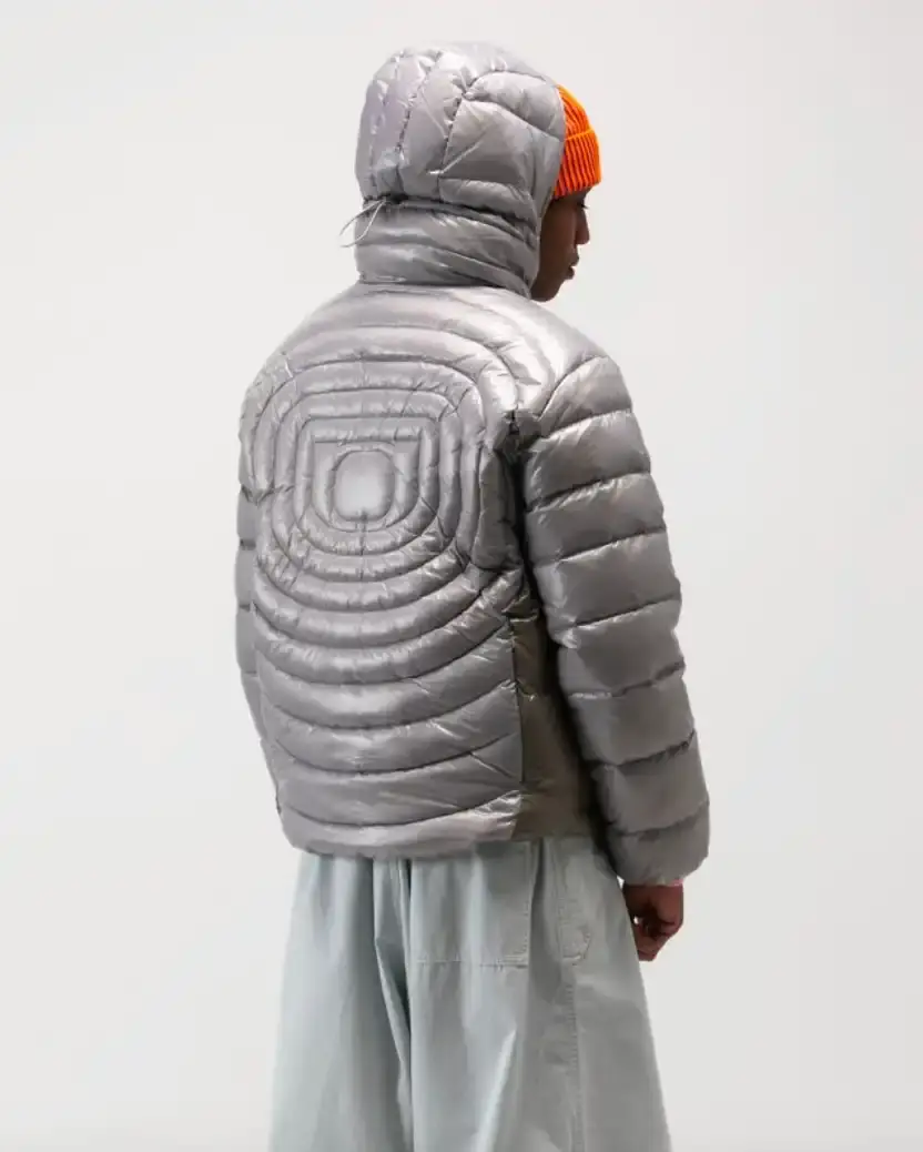ONE BLOCK DOWN FW25 COLLECTION LAUNCHES IN MILAN Article about One Block Down's Fall/Winter 2025 collection, which combines medieval imagery, hockey aesthetics, and European winter sports culture in a streetwear context. (image 18 of 21)