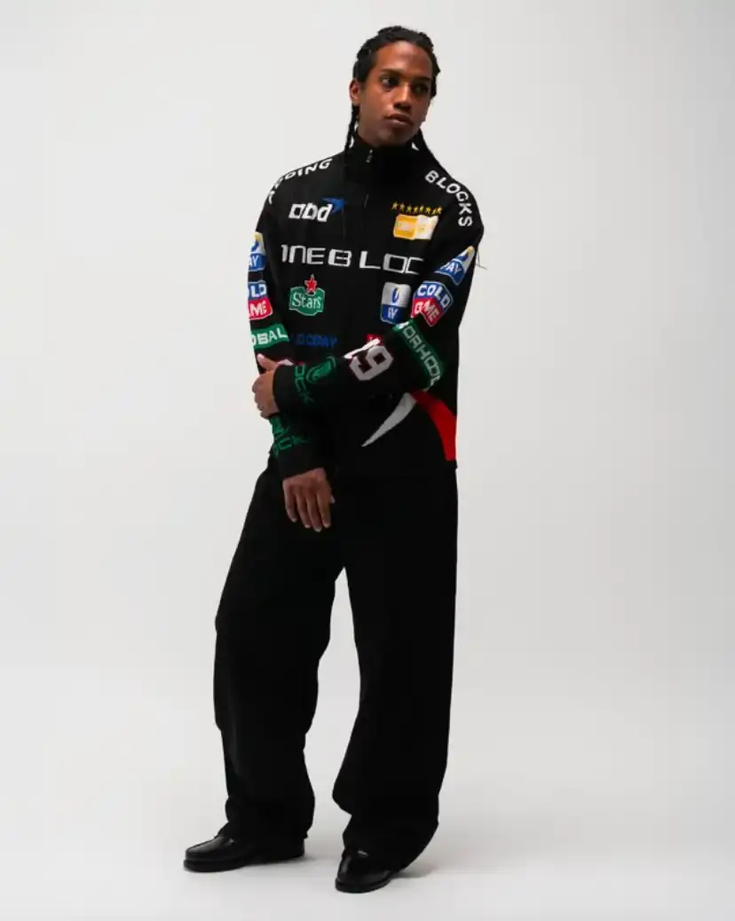ONE BLOCK DOWN FW25 COLLECTION LAUNCHES IN MILAN Article about One Block Down's Fall/Winter 2025 collection, which combines medieval imagery, hockey aesthetics, and European winter sports culture in a streetwear context. (image 12 of 21)