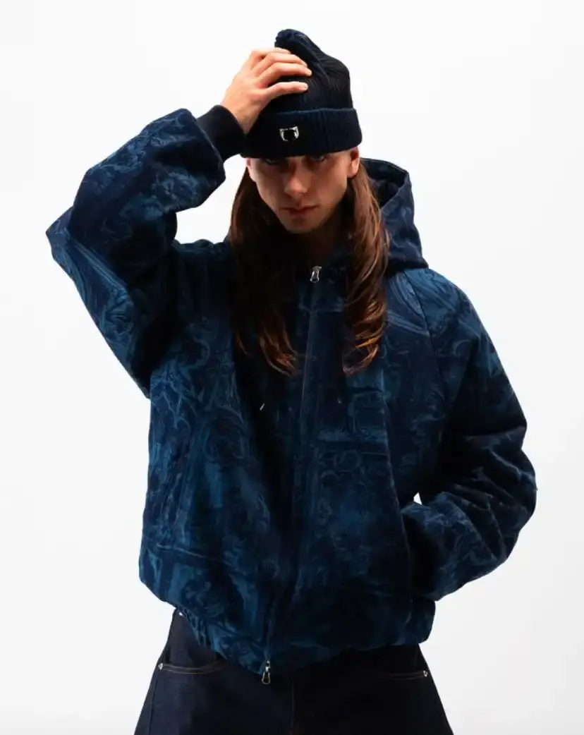 ONE BLOCK DOWN FW25 COLLECTION LAUNCHES IN MILAN Article about One Block Down's Fall/Winter 2025 collection, which combines medieval imagery, hockey aesthetics, and European winter sports culture in a streetwear context. (image 15 of 21)