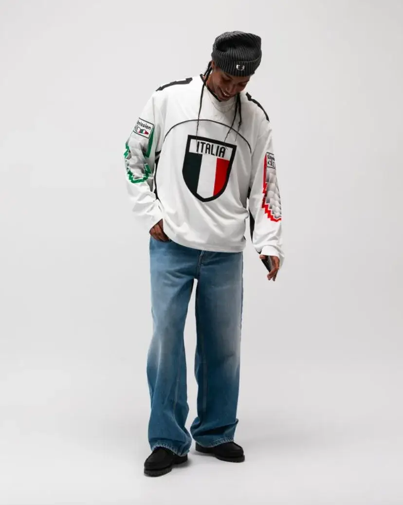 ONE BLOCK DOWN FW25 COLLECTION LAUNCHES IN MILAN Article about One Block Down's Fall/Winter 2025 collection, which combines medieval imagery, hockey aesthetics, and European winter sports culture in a streetwear context. (image 5 of 21)