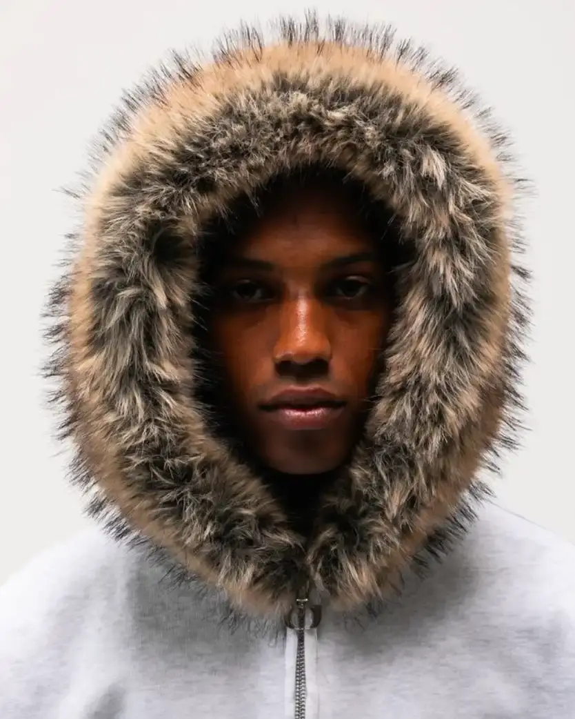 ONE BLOCK DOWN FW25 COLLECTION LAUNCHES IN MILAN Article about One Block Down's Fall/Winter 2025 collection, which combines medieval imagery, hockey aesthetics, and European winter sports culture in a streetwear context. (image 21 of 21)