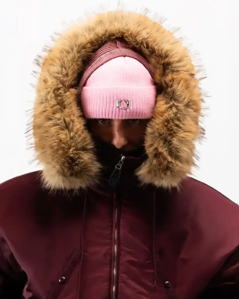 ONE BLOCK DOWN FW25 COLLECTION LAUNCHES IN MILAN Article about One Block Down's Fall/Winter 2025 collection, which combines medieval imagery, hockey aesthetics, and European winter sports culture in a streetwear context. (image 9 of 21)
