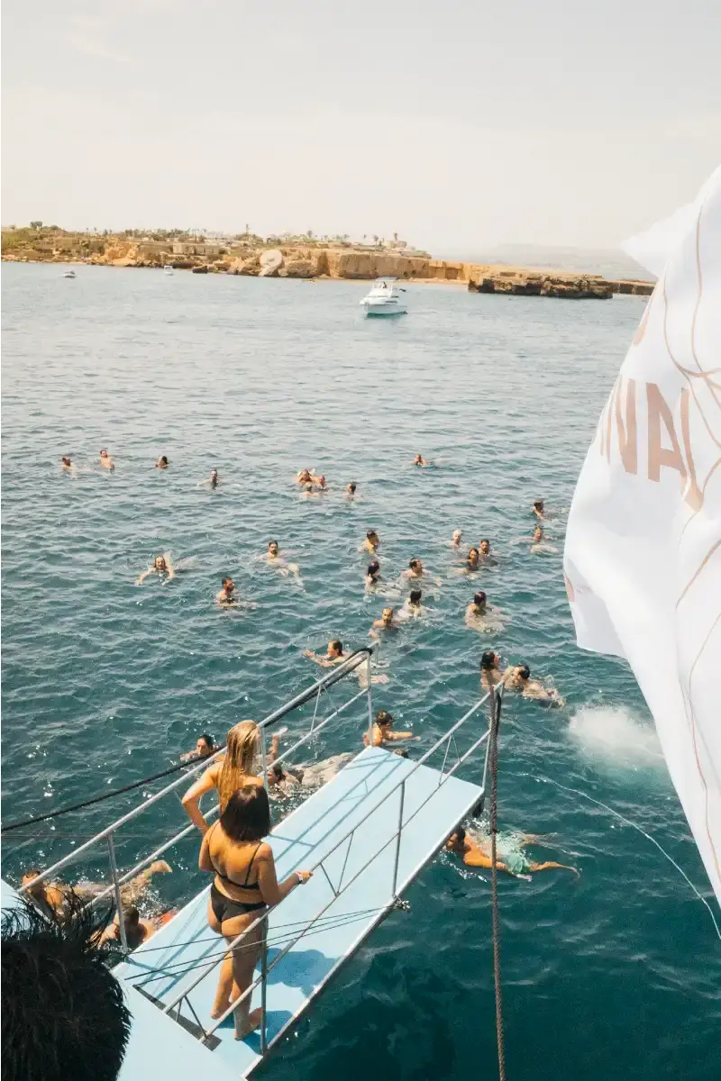 image about Ortigia Music Festival, a four-day electronic music event taking place on the island of Ortigia in Sicily from July 31 to August 3, 2025. The content describes the festival's venues including boat parties, beach stages, and late-night indoor spaces, along with performer lineup details and scheduling information. The article provides factual coverage of the event's programming, location context, and ticketing information for readers interested in electronic music festivals in the Mediterranean region. (image 3 of 3)