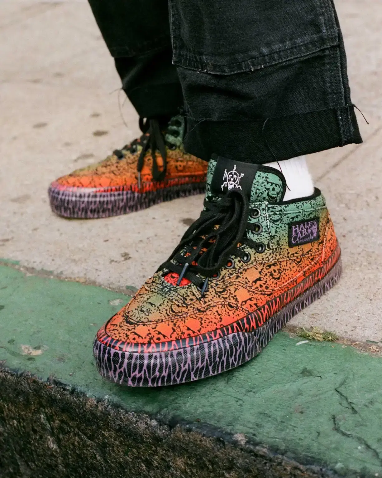 OTW BY VANS AND BAD IDEA BY CHITO LAUNCH THE HALF CAB 33 Wreckpack applies airbrush details to the Half Cab 33 while Liter adds geometric textile layers to a dark crewneck sweatshirt. (image 4 of 4)