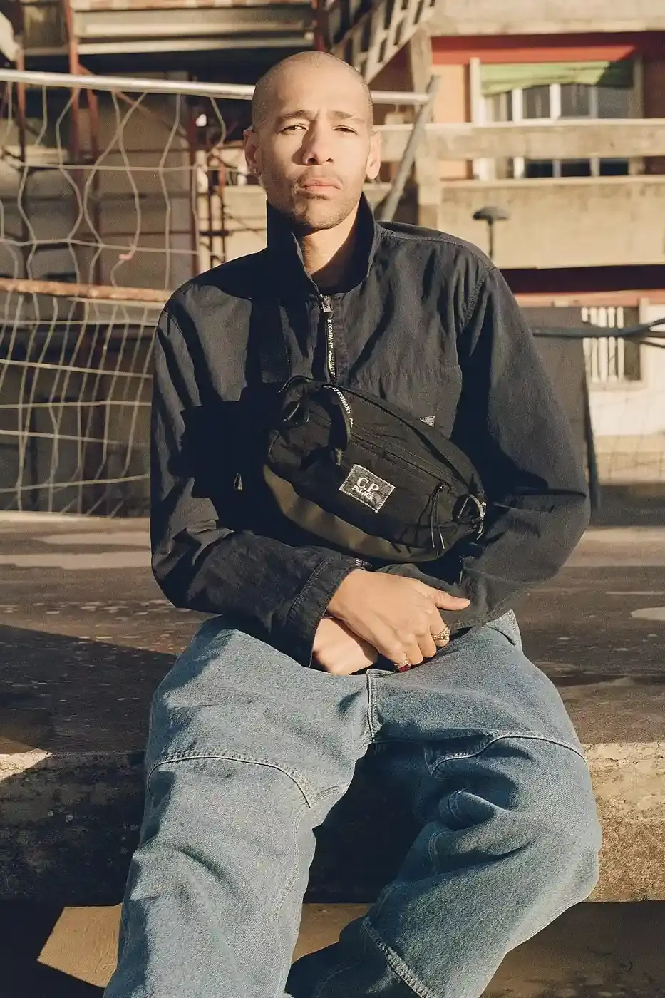 PALACE MEETS C.P. COMPANY: SKATE STYLE FUSES WITH ITALIAN CRAFT A fashion collaboration between Palace and C.P. Company. It details the "C.P. Palace" capsule collection featuring the Goggle Jacket, denim pieces, and various apparel in blue and khaki colors. The article provides information about the collection's availability starting March 28 at C.P. Company and Palace stores in multiple cities, plus a special pop-up at Dover Street Market Paris from March 28-30. (image 19 of 21)