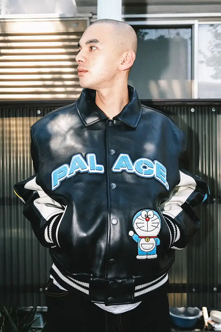 PALACE X DORAEMON COLLECTION DROPS FALL 2025 image of Palace streetwear brand collaborates with Japanese anime character Doraemon on clothing collection including jackets, shirts, and accessories. (image 2 of 11)
