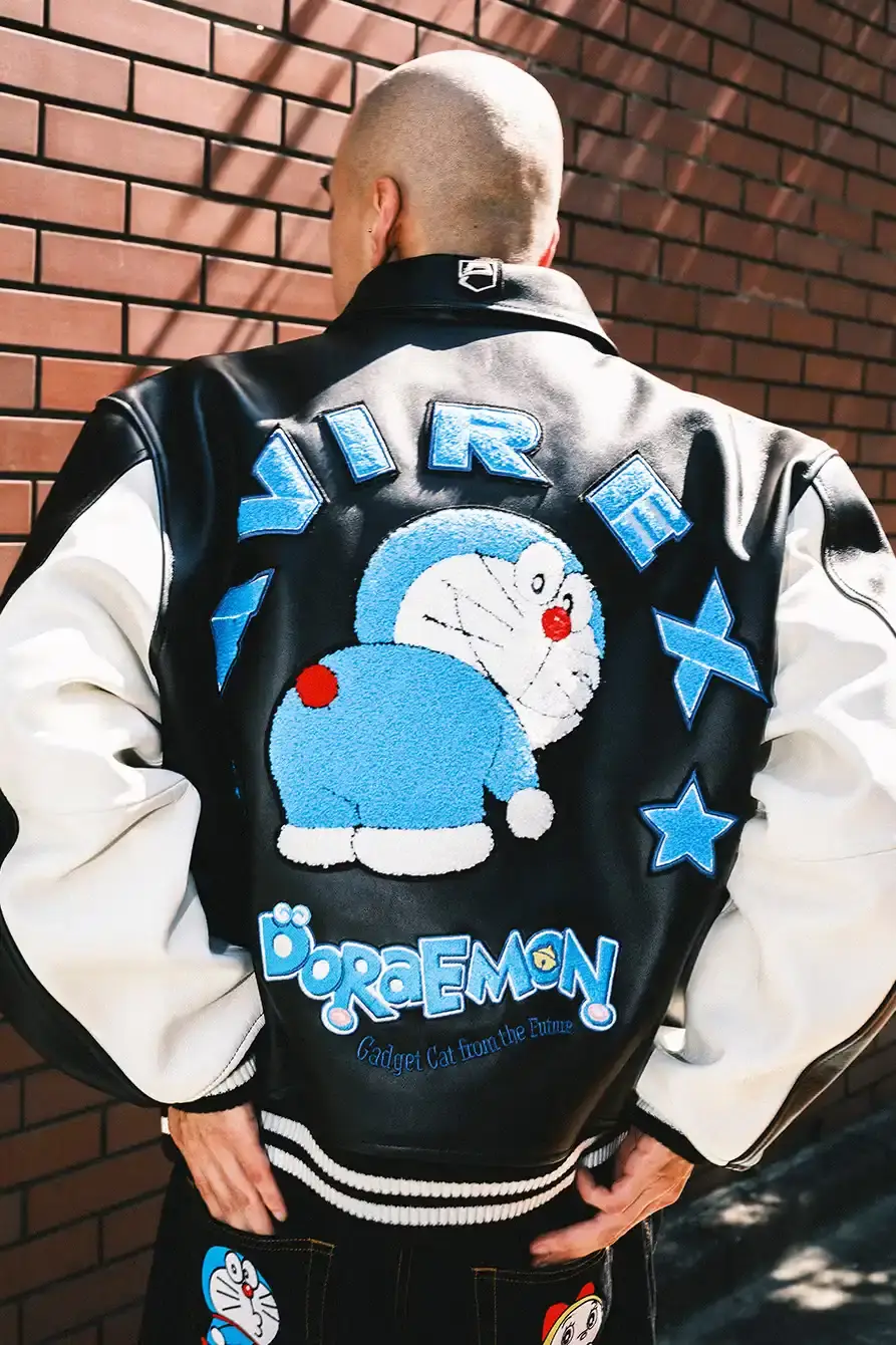 PALACE X DORAEMON COLLECTION DROPS FALL 2025 image of Palace streetwear brand collaborates with Japanese anime character Doraemon on clothing collection including jackets, shirts, and accessories. (image 11 of 11)