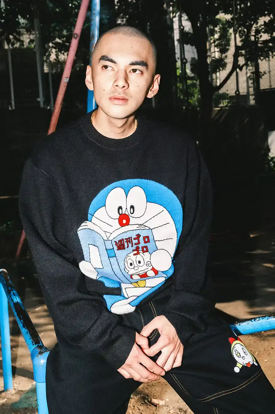PALACE X DORAEMON COLLECTION DROPS FALL 2025 image of Palace streetwear brand collaborates with Japanese anime character Doraemon on clothing collection including jackets, shirts, and accessories. (image 10 of 11)