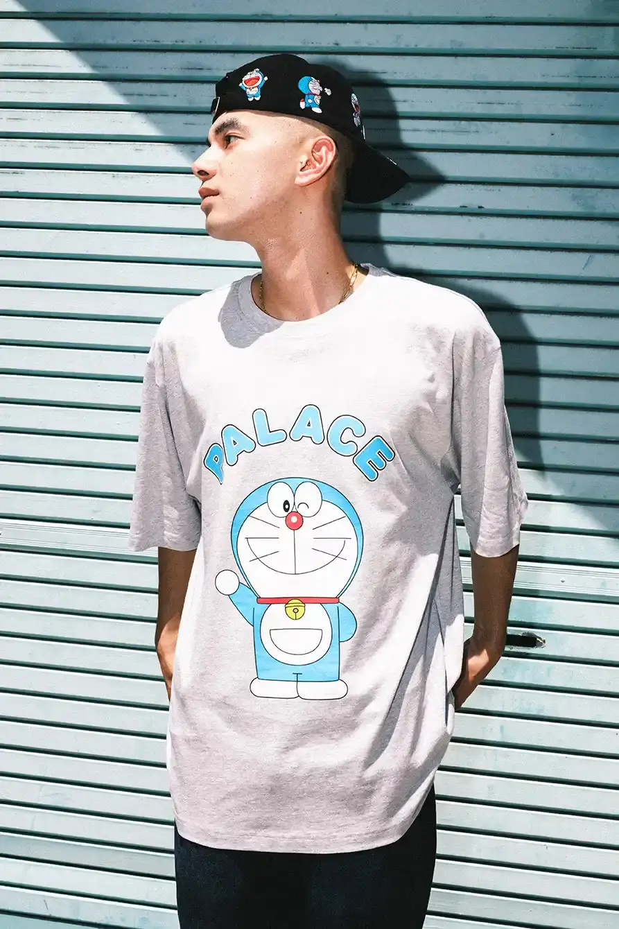 PALACE X DORAEMON COLLECTION DROPS FALL 2025 image of Palace streetwear brand collaborates with Japanese anime character Doraemon on clothing collection including jackets, shirts, and accessories. (image 7 of 11)