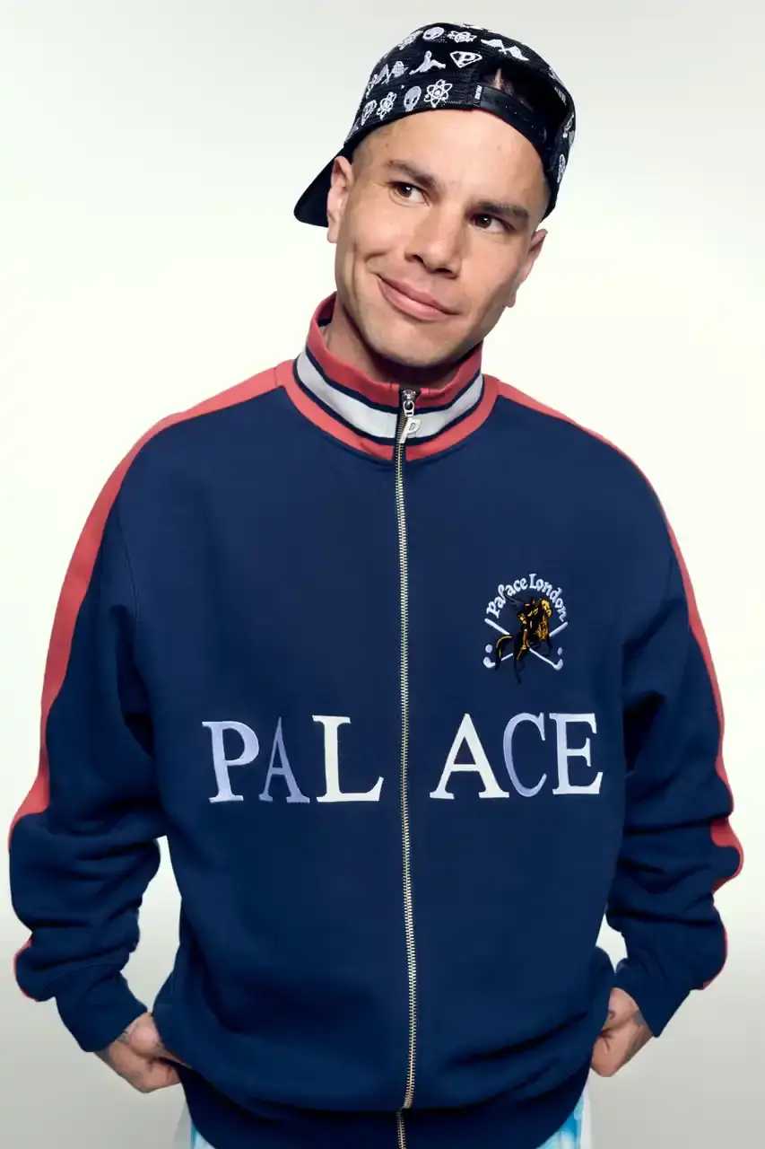 PALACE SUMMER 2025 COLLECTION: LONDON LABEL REVEALS SEASONAL LINEUP image of Palace's Summer 2025 collection announcement, describing the London streetwear brand's new seasonal offerings. It details the collection's design influences (Americana, sportswear, military), highlights key pieces including Los Angeles-themed items, religious iconography adaptations, and mesh garments for warm weather. The text also provides specific release dates and times for different global regions including the UK, Europe, US, Japan, Seoul, and China, with information about both online and physical store availability. (image 32 of 36)