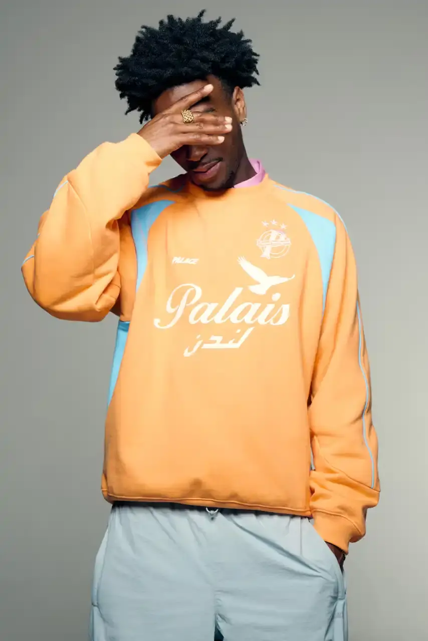 PALACE SUMMER 2025 COLLECTION: LONDON LABEL REVEALS SEASONAL LINEUP image of Palace's Summer 2025 collection announcement, describing the London streetwear brand's new seasonal offerings. It details the collection's design influences (Americana, sportswear, military), highlights key pieces including Los Angeles-themed items, religious iconography adaptations, and mesh garments for warm weather. The text also provides specific release dates and times for different global regions including the UK, Europe, US, Japan, Seoul, and China, with information about both online and physical store availability. (image 16 of 36)