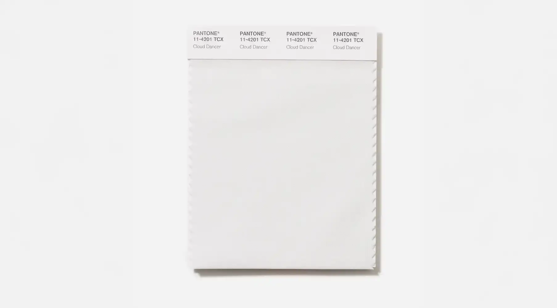 Pantone announces Cloud Dancer, a neutral white tone coded 11-4201, as the 2026 Color of the Year, chosen to represent peace and mental clarity in response to modern sensory overload.