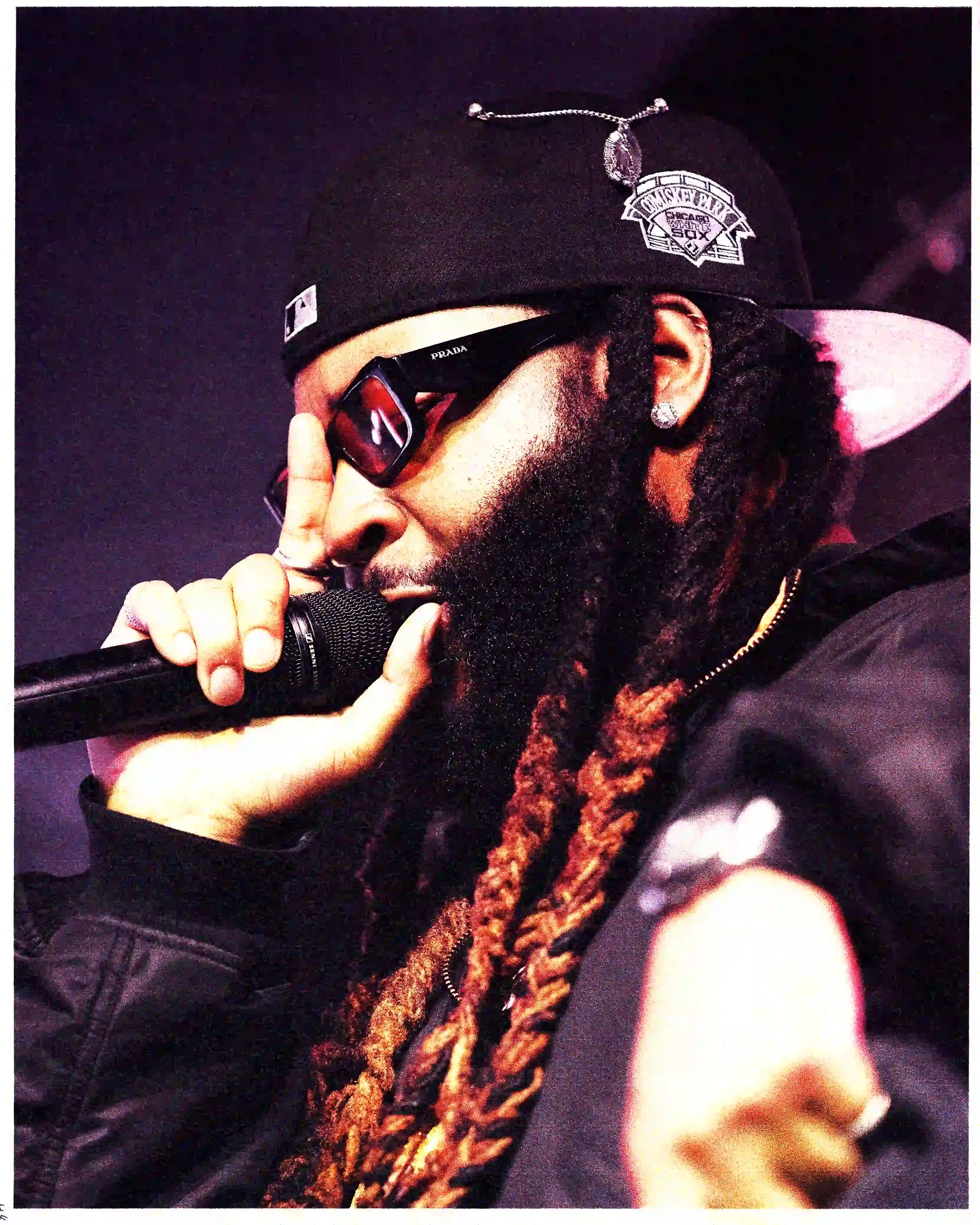 Article about Partynextdoor's concert at Fabrique Milan on November 2nd, 2024. The text covers the performance details, venue atmosphere, setlist highlights, and stage production of the Canadian R&B artist's show. The article describes a 90-minute performance featuring both old and new songs, minimal stage design, and a four-piece live band. Information about the tour's next destinations is included at the end