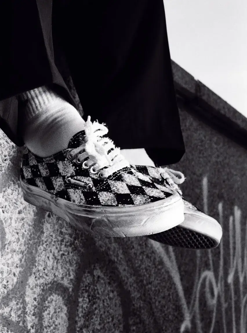 PAURA X VANS AUTHENTIC RETURNS IN A LIMITED RE-RELEASE Black and white Paura x Vans Authentic with airbrushed diamond checkerboard canvas