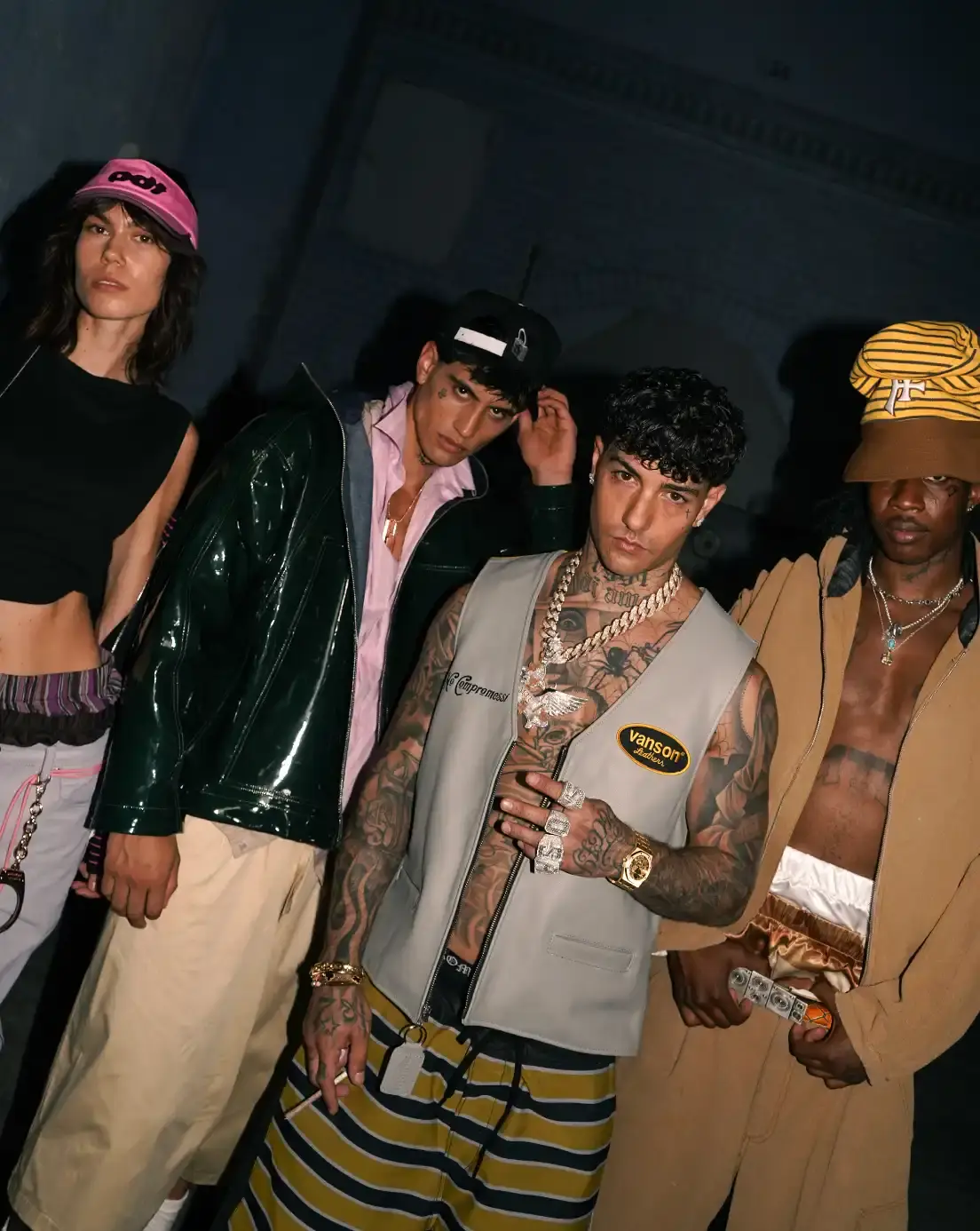 PDF'S PRISON-THEMED SHOW AT MILAN FASHION WEEK image about Pdf brand's theatrical runway presentation at Milan Fashion Week, featuring celebrity models in a recreated prison setting to showcase streetwear designs with themes of creative freedom and constraint. shoot by Costanza Terranova (image 5 of 20)