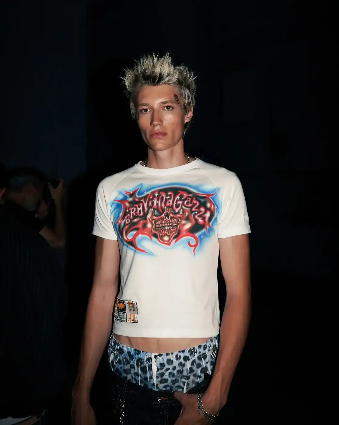 PDF'S PRISON-THEMED SHOW AT MILAN FASHION WEEK image about Pdf brand's theatrical runway presentation at Milan Fashion Week, featuring celebrity models in a recreated prison setting to showcase streetwear designs with themes of creative freedom and constraint. shoot by Costanza Terranova (image 8 of 20)