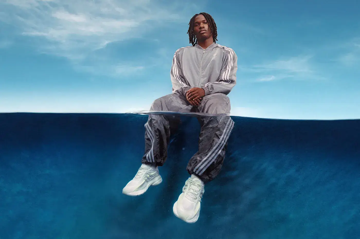 PHARRELL ADIDAS VIRGINIA ADISTAR JELLYFISH Plain white background showing the all-white adidas VIRGINIA Adistar Jellyfish sneaker with a caged upper and thick wavy sole. (image 2 of 4)