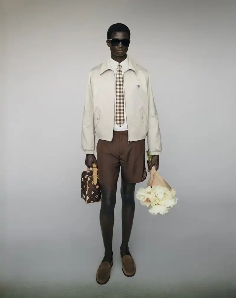 PHARRELL WILLIAMS UNVEILS LV SPRING MENSWEAR CAPSULE image about Pharrell Williams' new spring menswear capsule collection for Louis Vuitton featuring seasonal colors, tailoring details, and house motifs. (image 21 of 24)